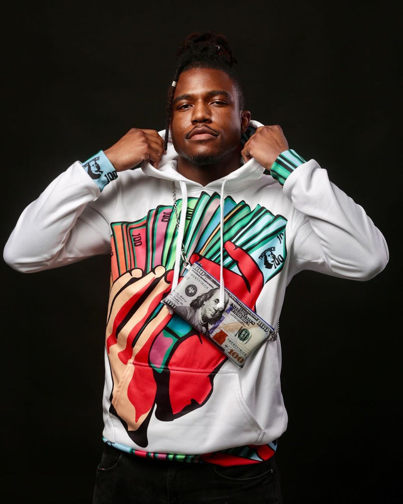 Model wears Money Fan White Pullover Hoodie by Twenty1Rich