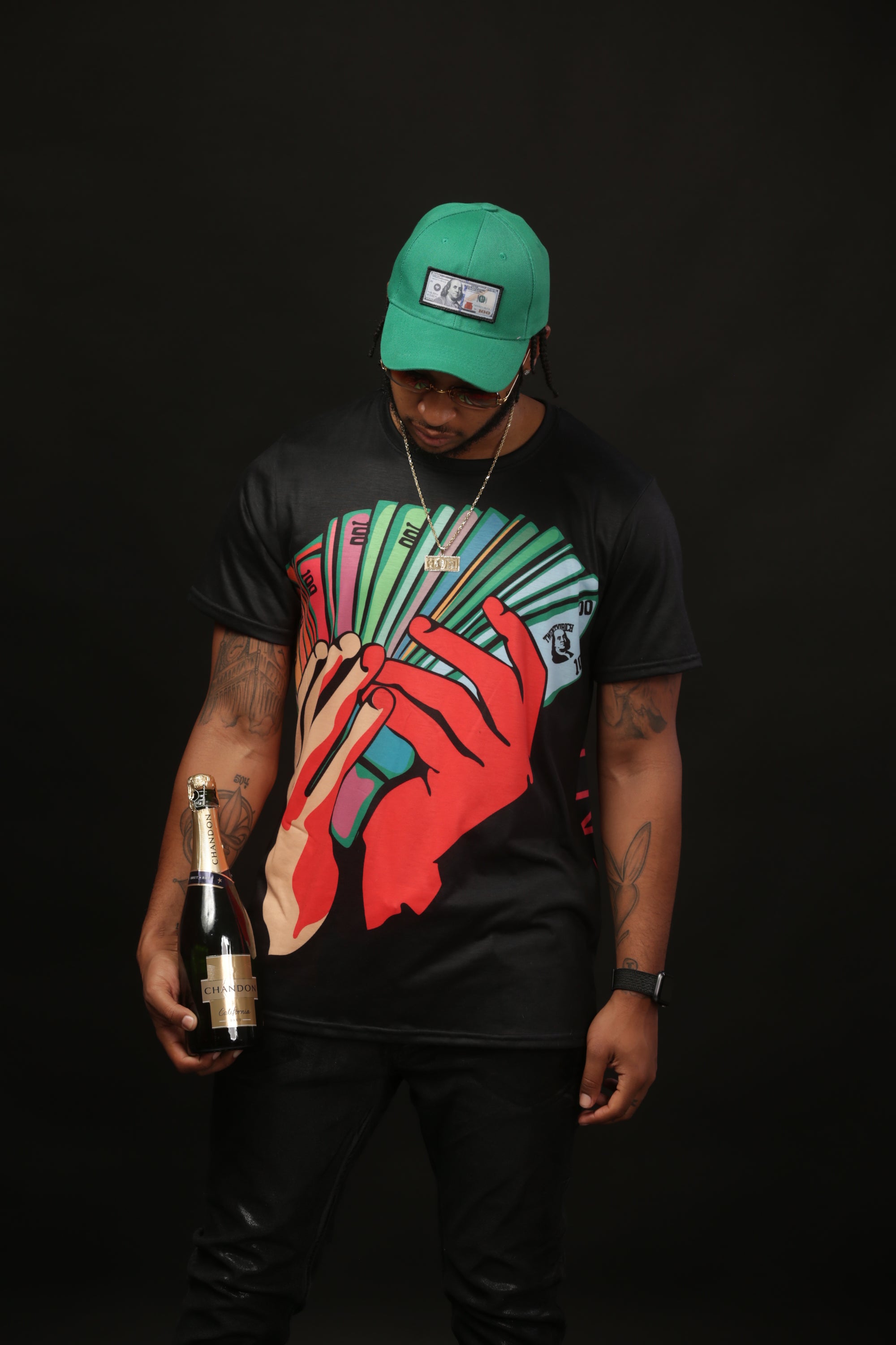 Model wears Money Fan Black Crew Neck Tee by Twenty1Rich